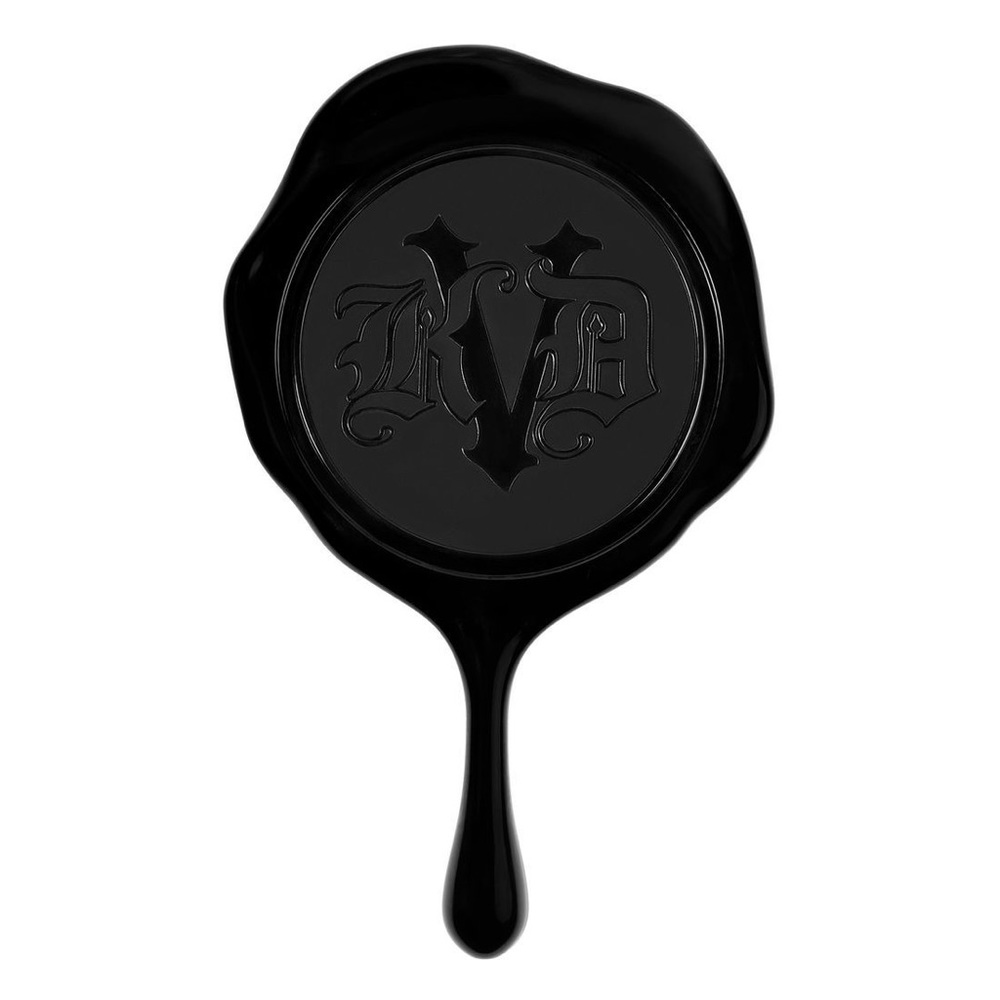 Kat Von D KVD Beauty hand mirror.